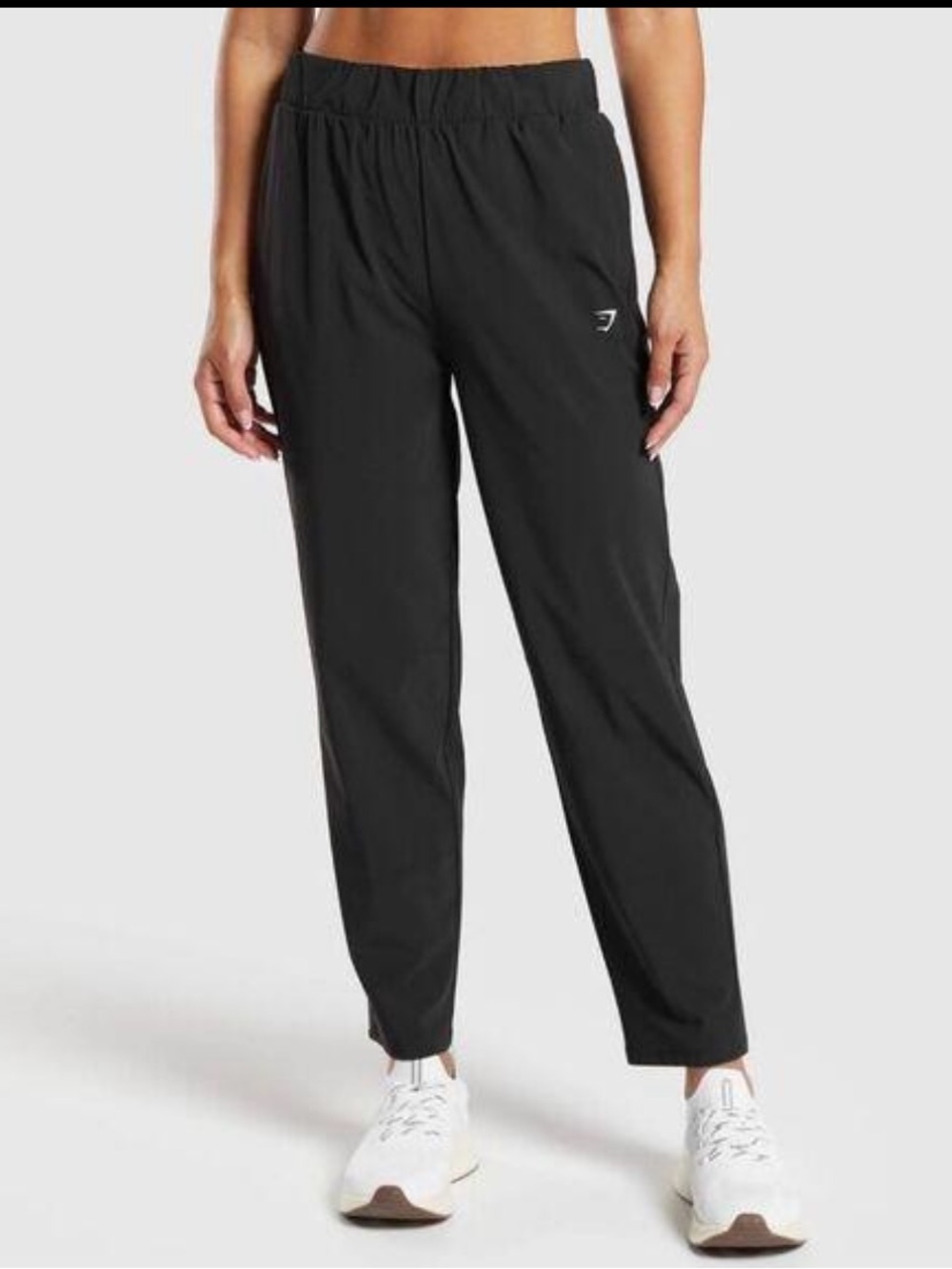 Woman’s Gymshark Arrival Woven Zip Hem Straight Taper Jogger Gray Size XS